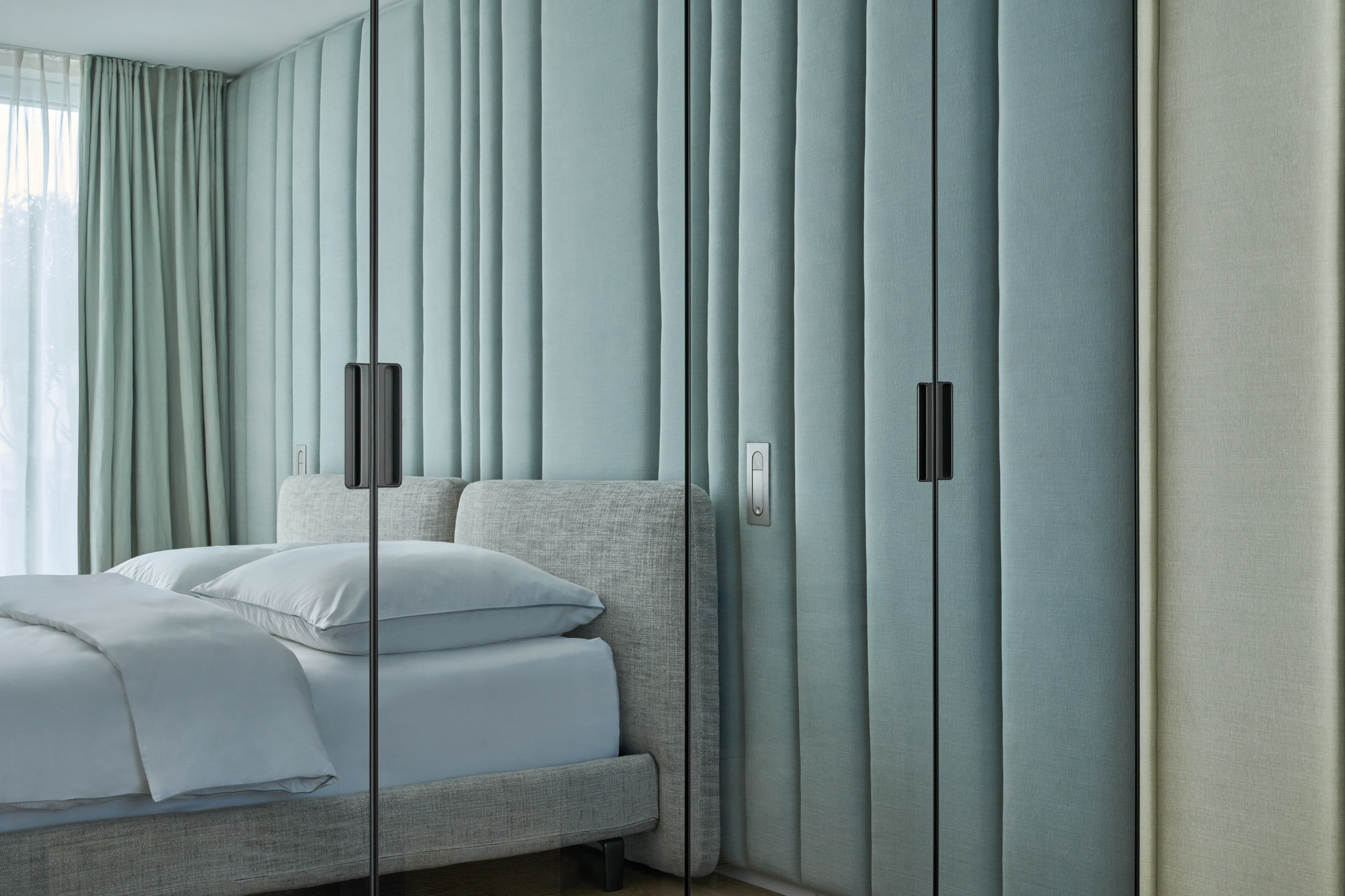 Guest Bedroom Wall covering turquoise aqua mint Minotti soft pad bed
